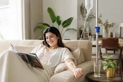 Women taking IV drip hydration for summer