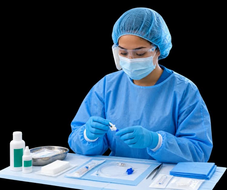 Sterile catheter care supplies prepared by a nurse for safe infection-control procedures.