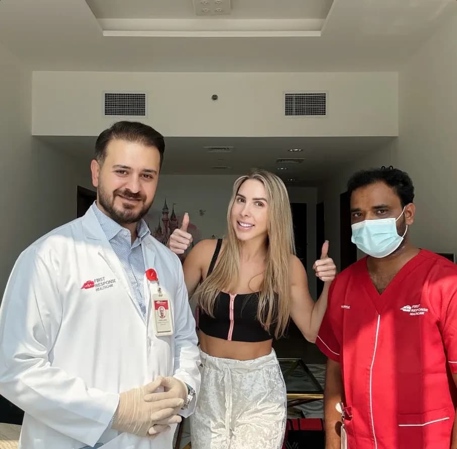 First Response Healthcare doctor and nurse with a satisfied patient in Dubai