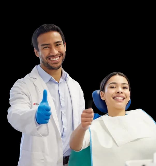 Dentist giving thumbs up with a satisfied patient during a home dental visit in Dubai