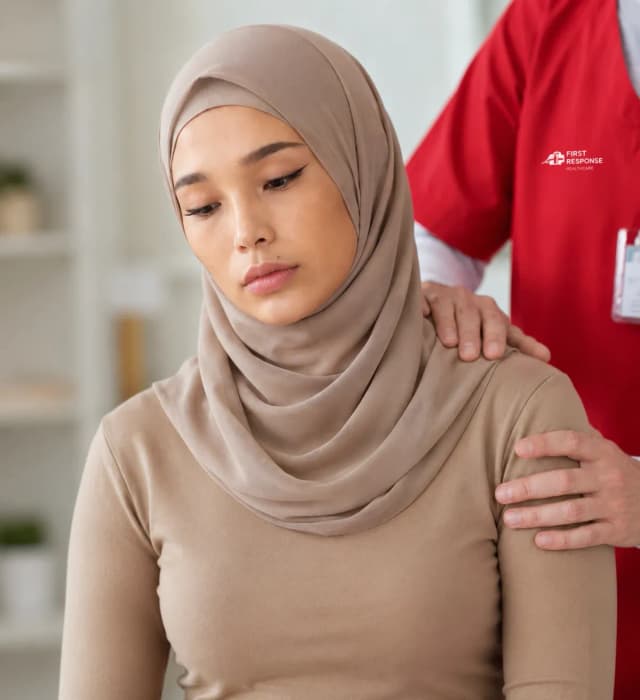 FRH physiotherapist treating a patient's shoulder