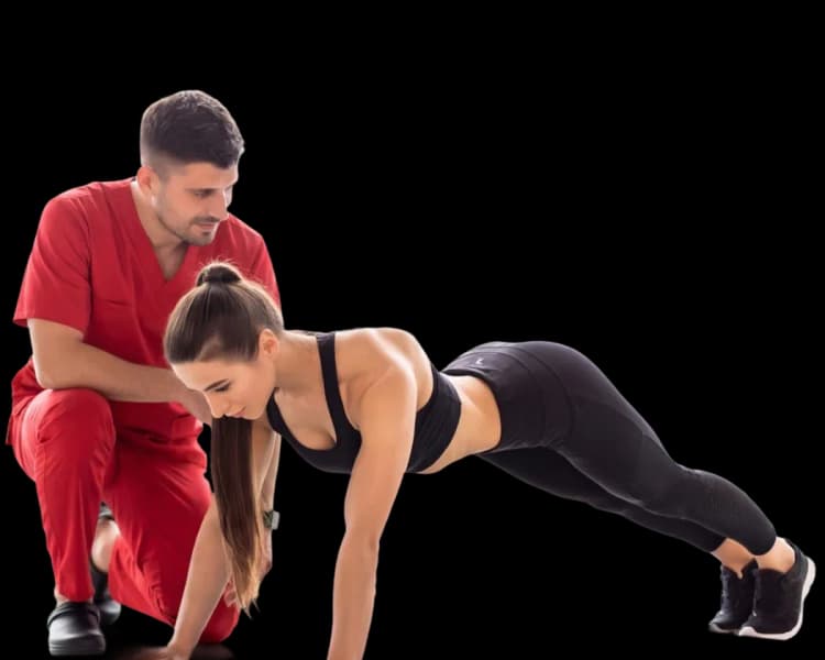 A male physiotherapist guiding a female patient through specialized pelvic floor strengthening exercises at home in Dubai.