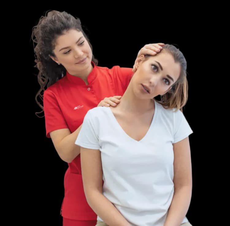 A female physiotherapist assisting a mother with targeted postpartum exercises for accelerated post-delivery healing at home in Dubai.