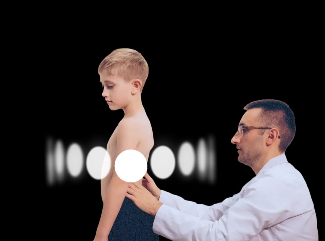 DHA-licensed pediatric physiotherapist evaluating a young boy's posture and alignment during a home visit in Dubai.