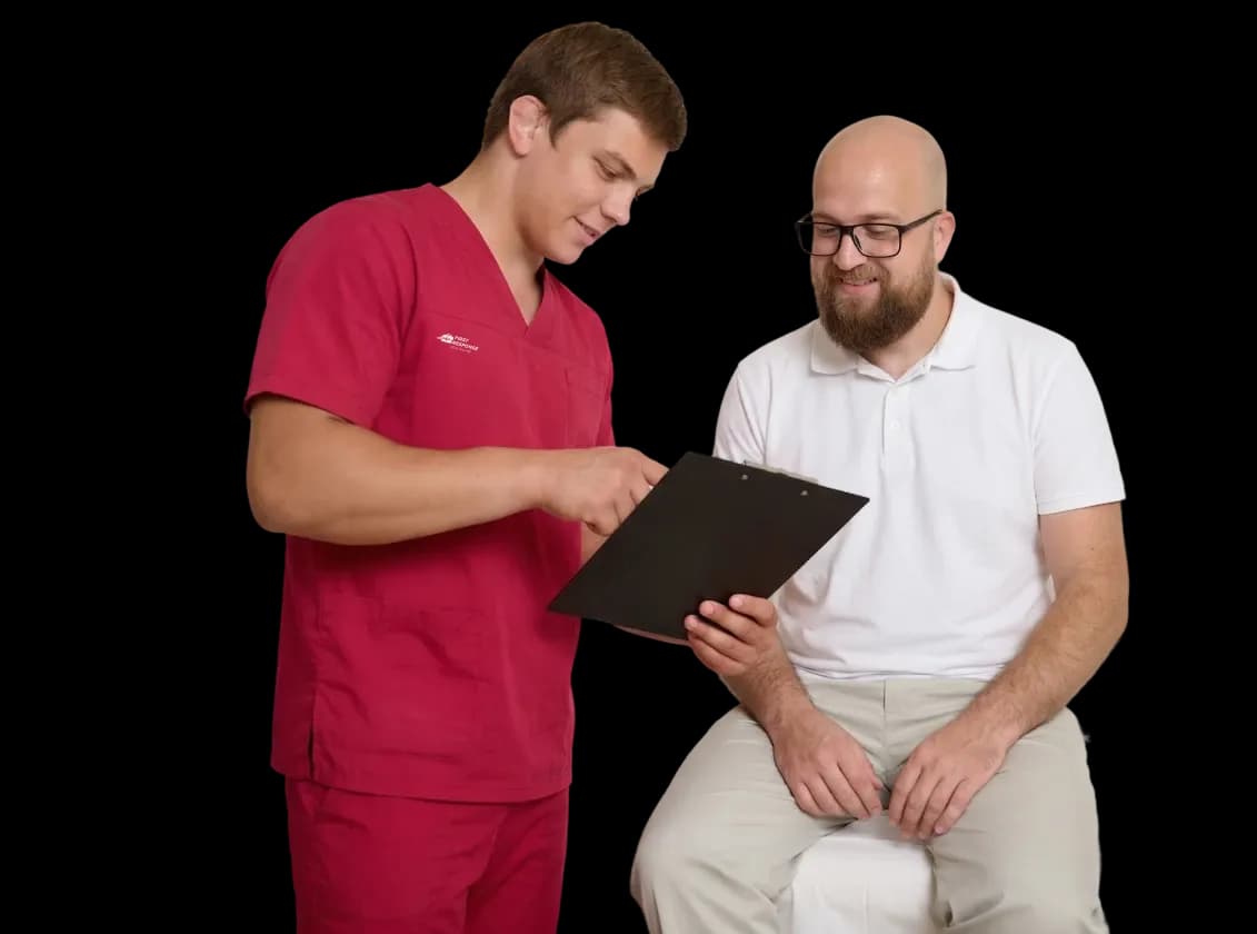 A male patient receiving custom physical rehabilitation and movement tracking from a First Response Healthcare physiotherapist at home in Dubai.