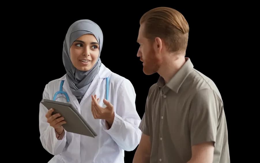 Experienced DHP-licensed doctor consulting a patient during a home visit in Qatar