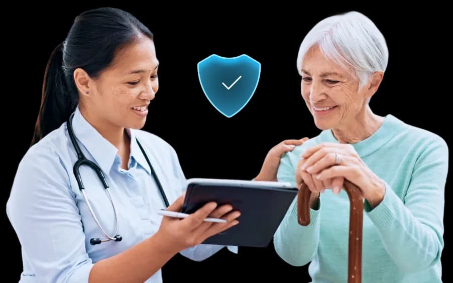 First Response Healthcare nurse sharing accredited lab test results with an elderly patient at home in Dubai