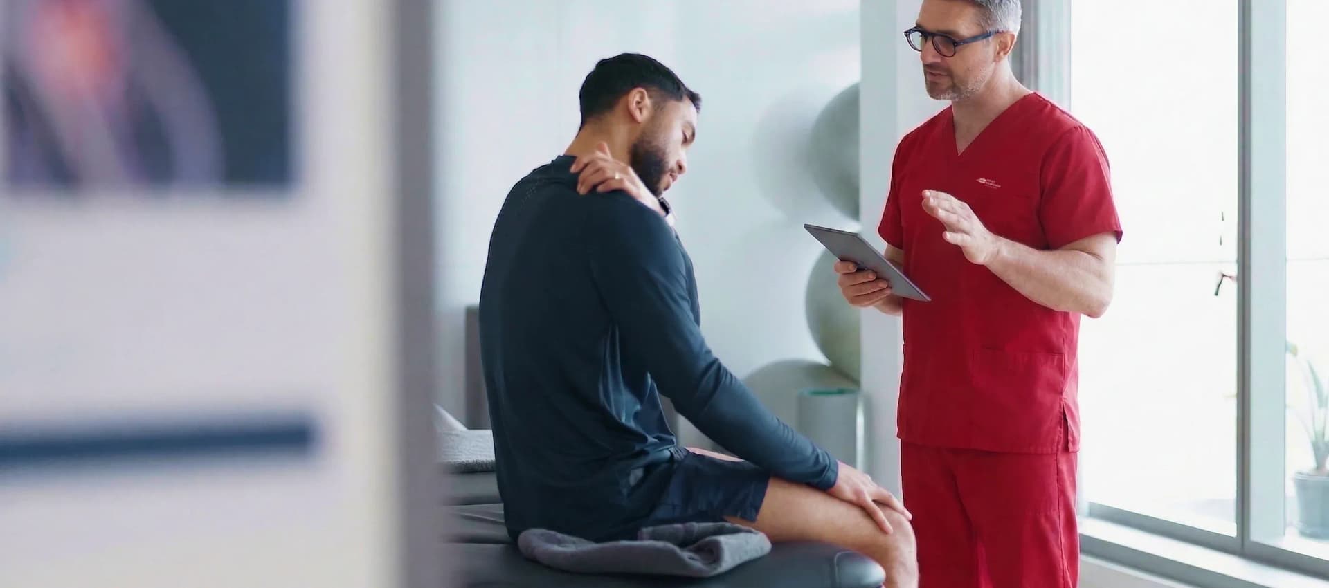 Home physiotherapy session in Dubai targeting frozen shoulder relief, joint mobility, and pain management.