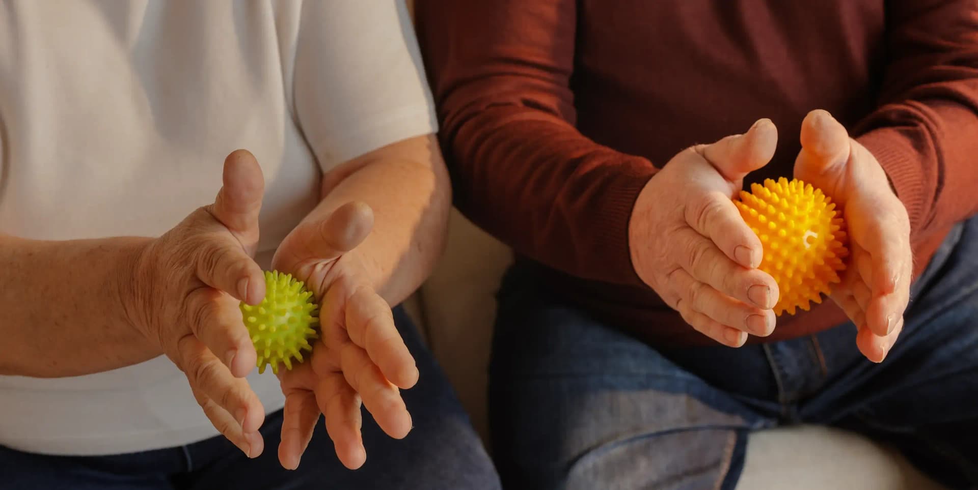 Close-up of a neurological rehabilitation exercise using a mobility ball.