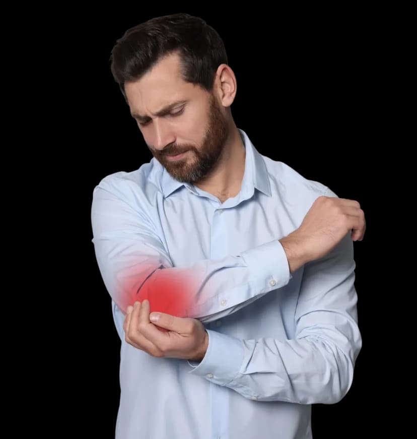A man holding his shoulder in pain, highlighting who can benefit from musculoskeletal physical therapy at home by First Response Healthcare in Dubai.