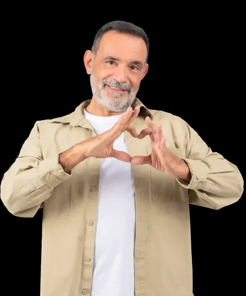 A man making a heart gesture with his hands to represent cardiopulmonary health care.