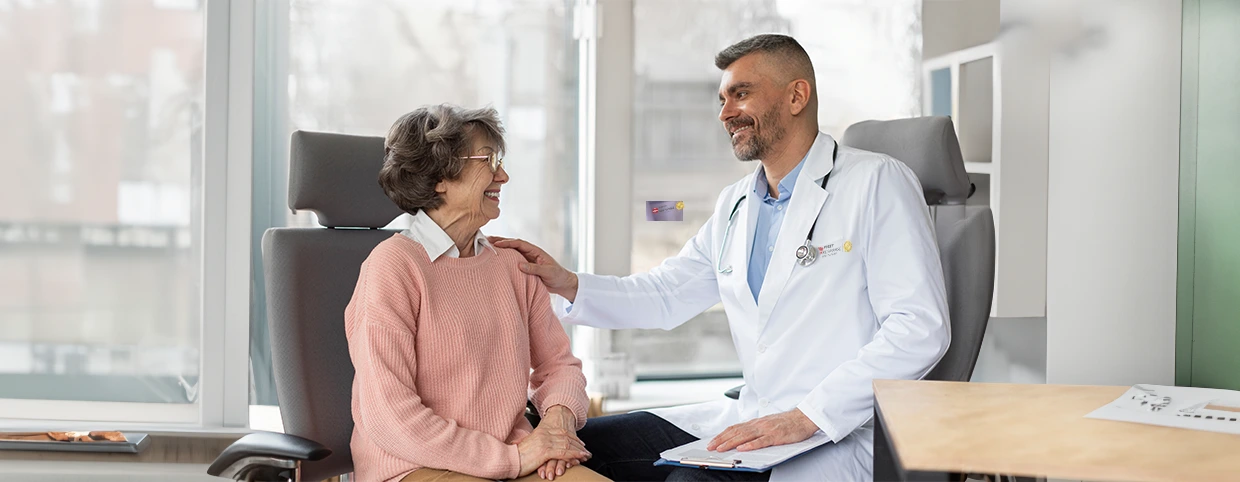 Doctor giving consultation to a senior patient