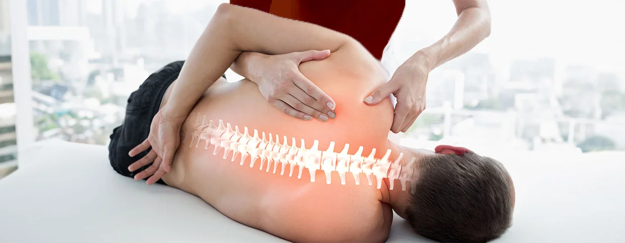 Physiotherapist treating a patient to relieve herniated Disc pain