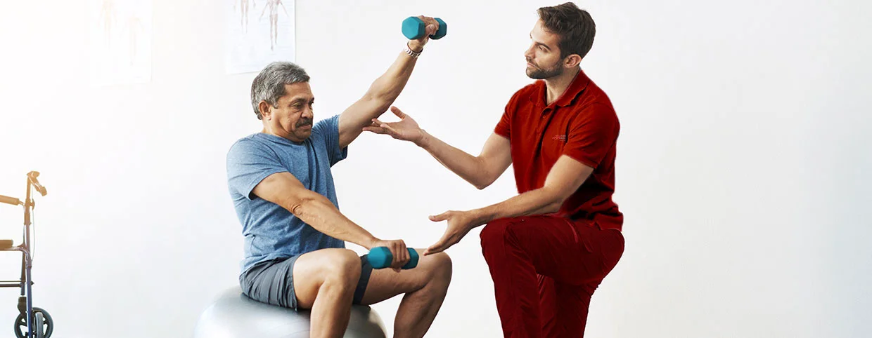 A Senior man getting physiotherapy treatment by a physiotherapist