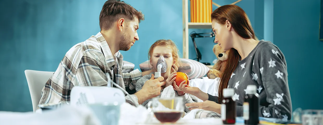 Parents taking care of their daughter