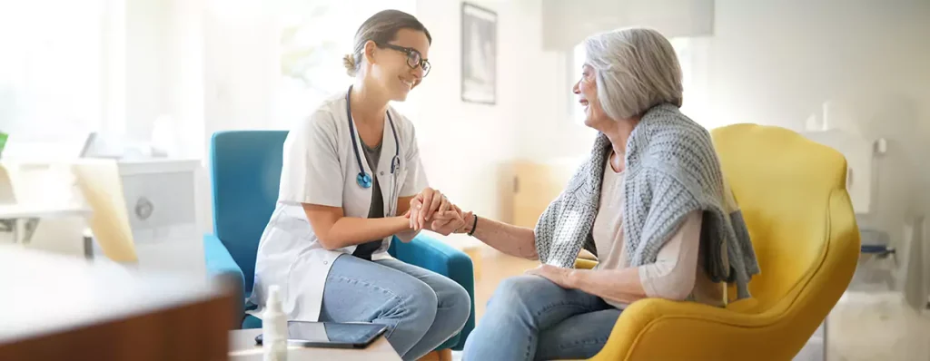 Patient and doctor smiling, highlighting follow-up care and long-term relationship