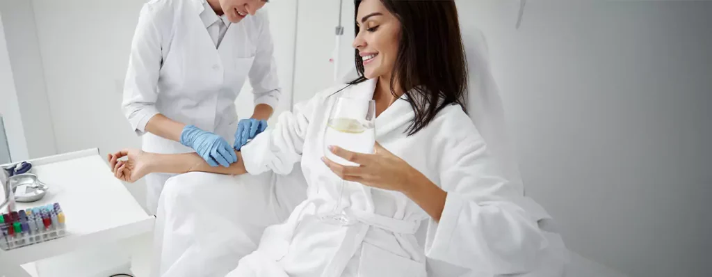 Doctor giving an IV Drip to a patient