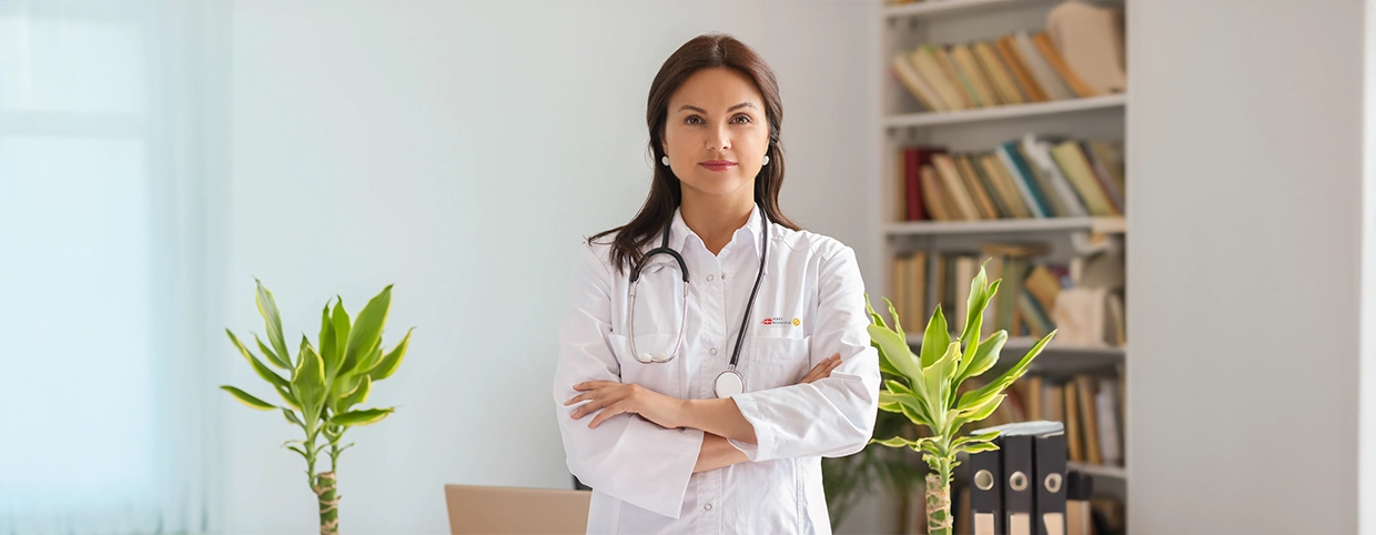 A doctor with folded hands at patient home.