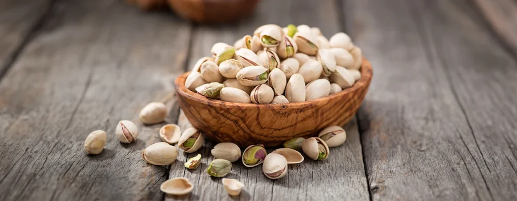 A bowl of pistachio nuts to enhance overall heart health