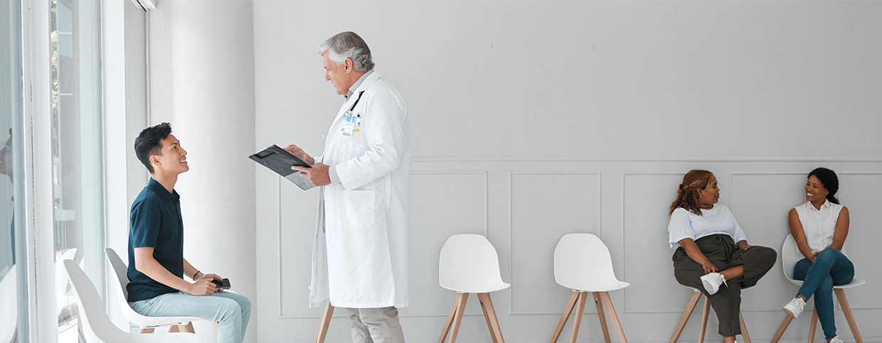 Doctor giving consultation to patient at hotel