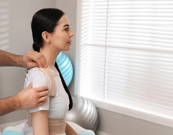 Physiotherapist giving treatment to a patient