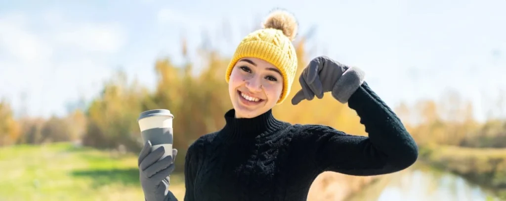 A Woman taking a walk outside in winter