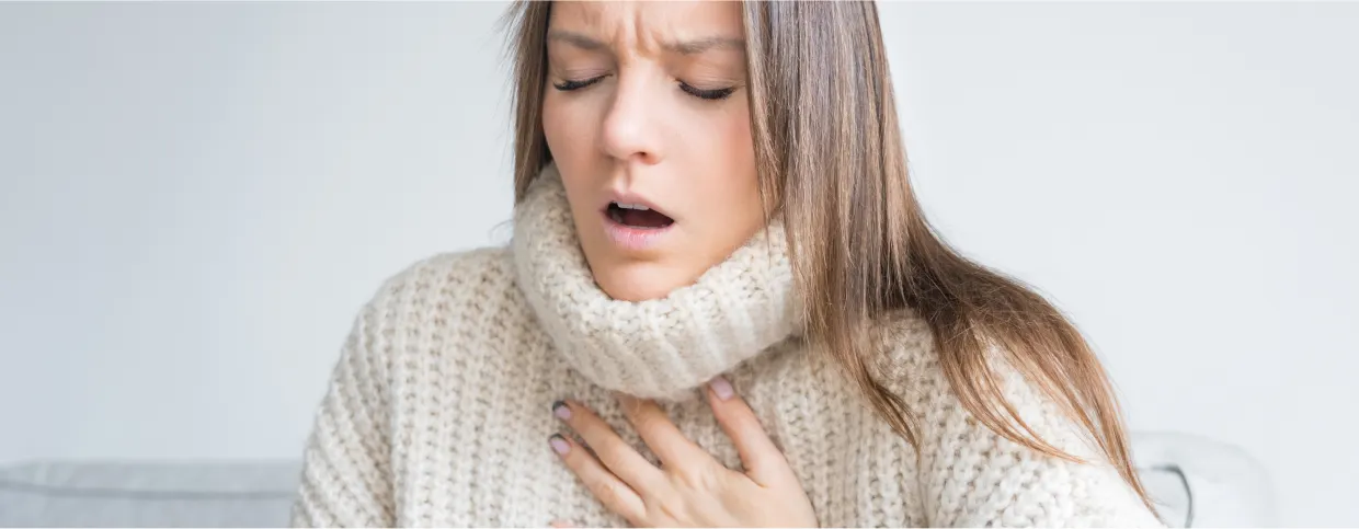 Woman having chest pain caused by heart disease